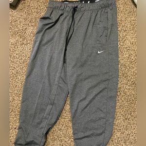 medium nike sweatpants they fit a large too